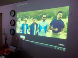 we have this really cool projector so music video dancing is on POINT.