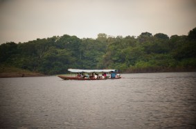kids on their way to school in the mornings on the Amazon river.